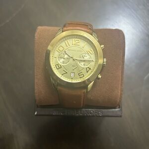 Michael Kors Gold Chronograph Watch with Brown Strap needs battery